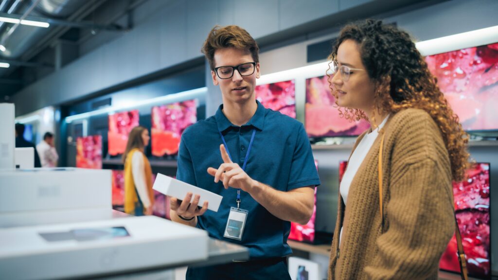 A direct sales professional educating a prospective customer